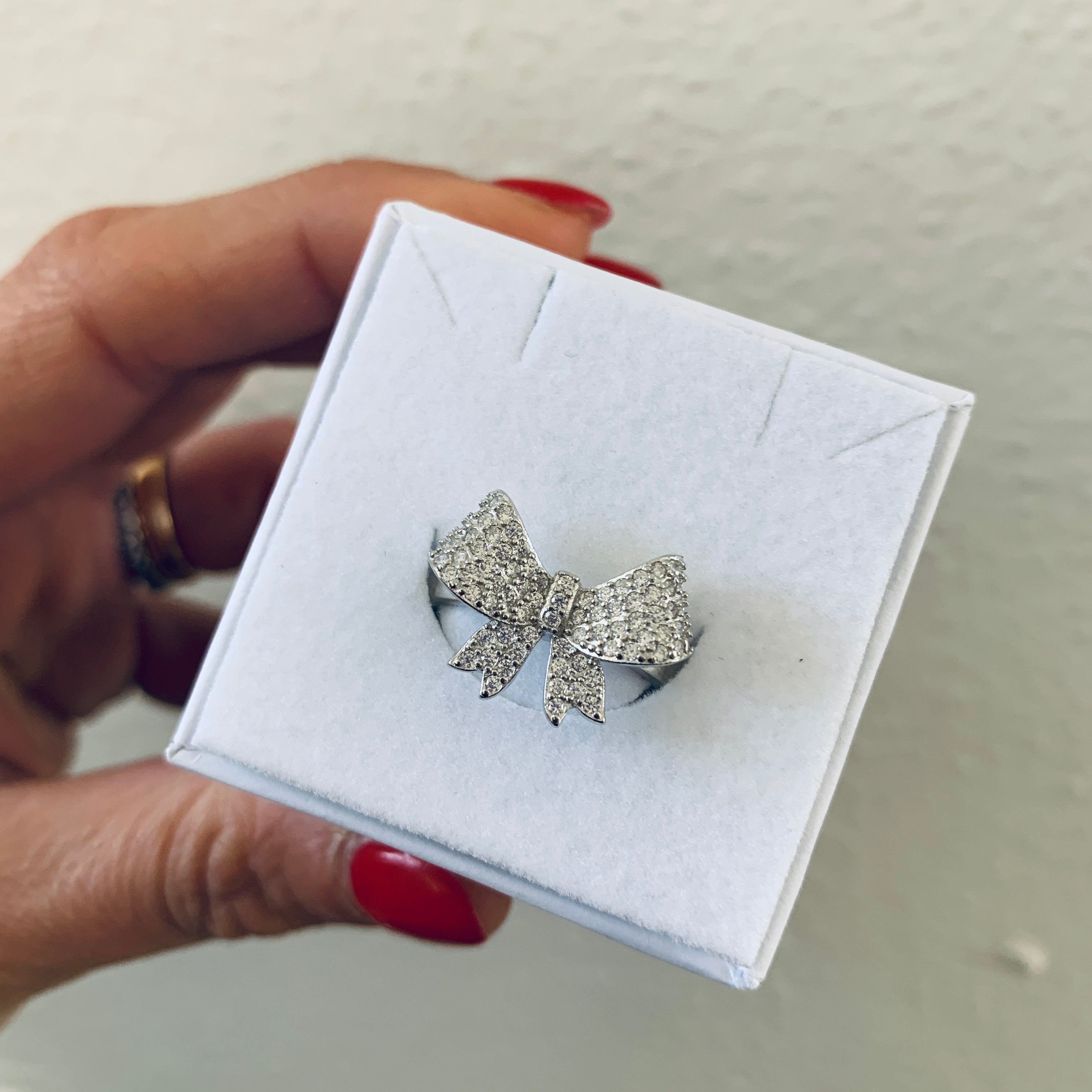 RabiosaJewels. anello fiocco regolabile in argento925 e zirconi bianchi.