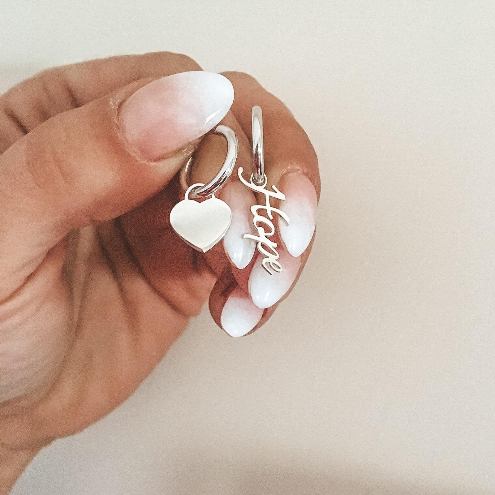 RabiosaJewels. mono hoop con parola in argento925. (4452943069247)