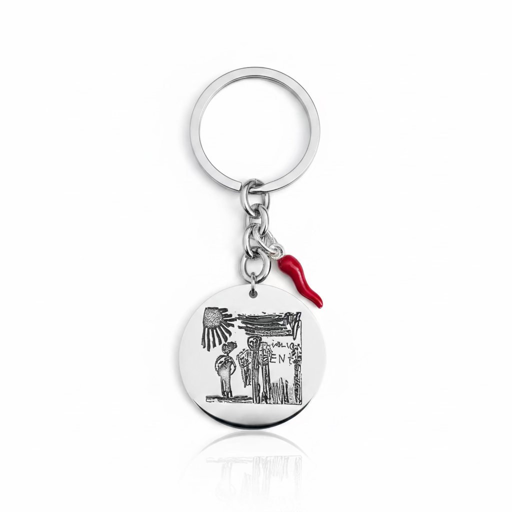 portachiavi con piastina in argento 925 e disegno personalizzato realizzato da bambini. rabiosajewels. disegno bambini