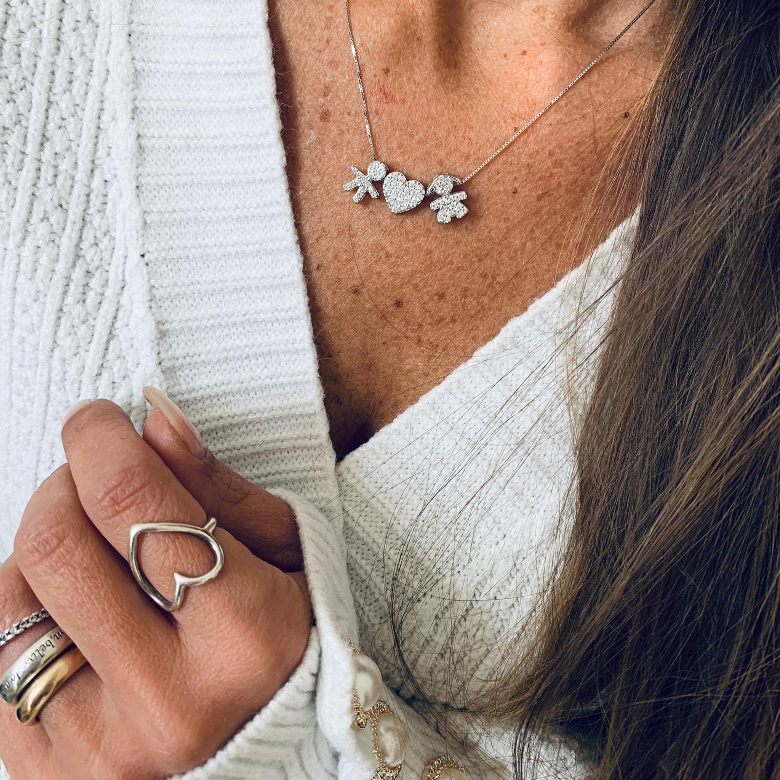 collana baby amorini in argento 925 con bimbo bimba e cuore in pavé di zirconi. disponibile silver gold e rosè. rabiosajewels