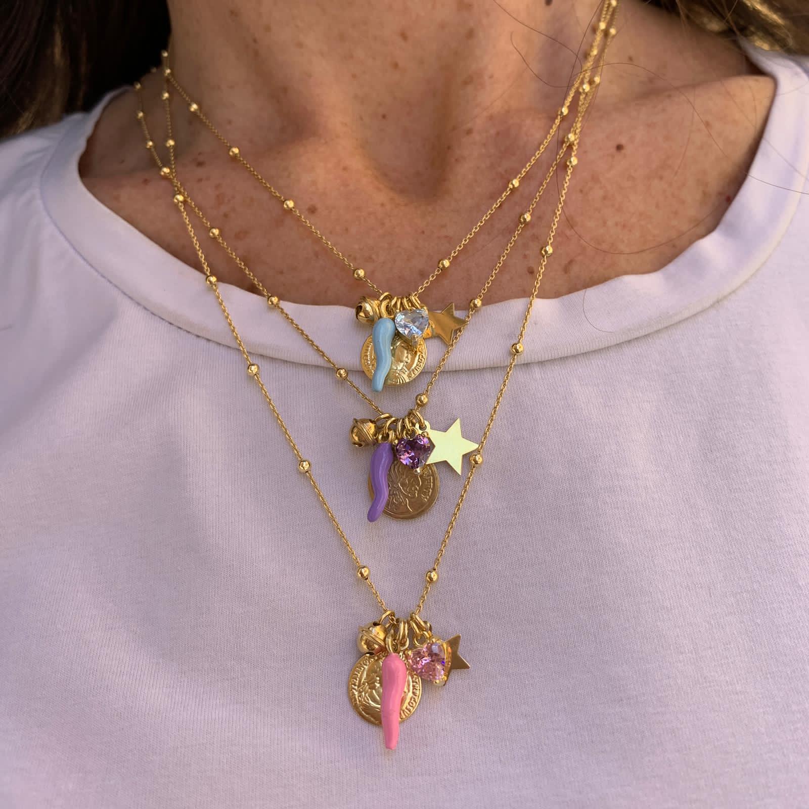 rabiosajewels. collana Ti Auguro in argento 925. collana multicharms. collana colori pastello. Ti auguro la protezione degli angeli tanta fortuna.un sacco di soldi.un amore speciale e di brillare come una stella.gold.cuore zircone glicine.cuore zircone rosa.cuore zircone acquamarina.indossata