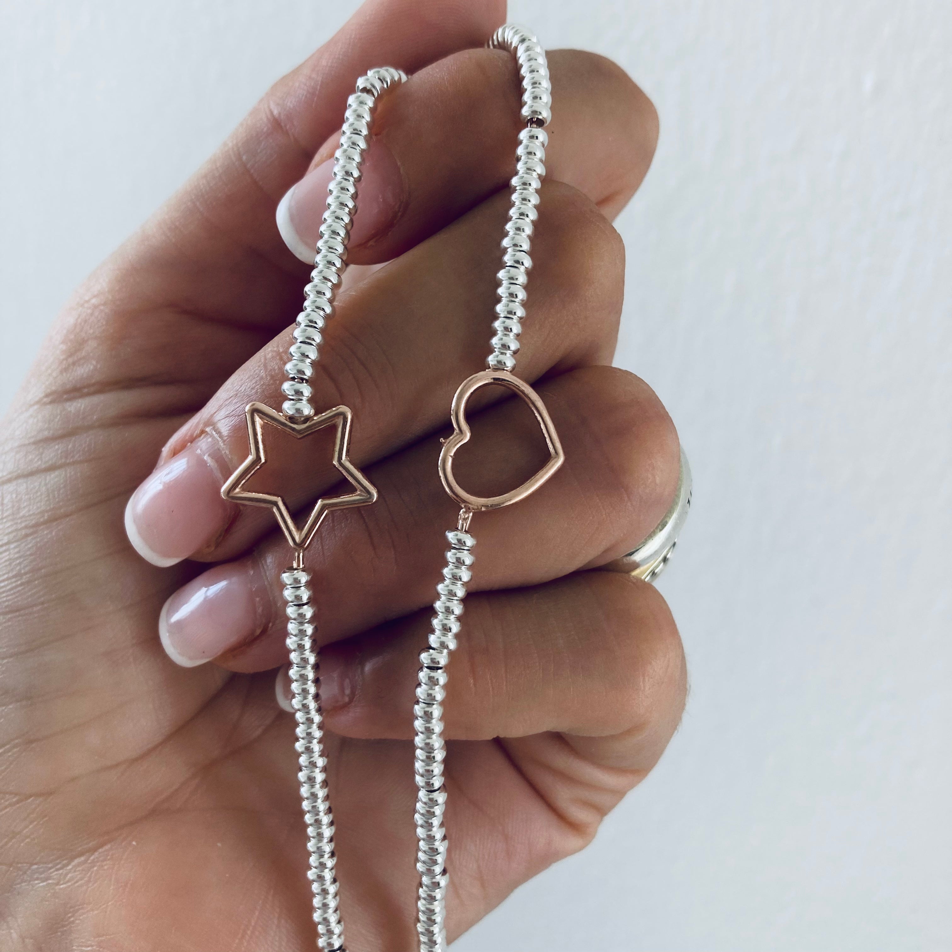 bracciale rondelle Joy in argento 925 con centrale cuore o stella. RabiosaJewels